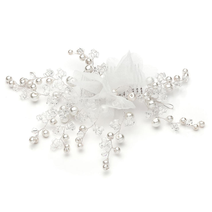 Handmade haircomb made with snowflake-inspired pearls and Swarovski stones